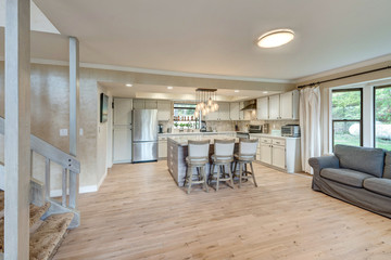 Luxury home dining room and kitchen interior with natural rustic modern deisgn.