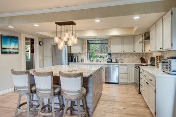 Luxury home dining room and kitchen interior with natural rustic modern deisgn.