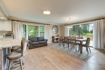 Luxury home dining room and kitchen interior with natural rustic modern deisgn.