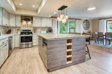 Luxury home dining room and kitchen interior with natural rustic modern deisgn.