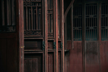 Red chinese door at Garden of Cultivation(Yi Pu) built on 1541 at Suzhou,Jiangsu,China.Which is registered in UNESCO World Heritage with classical gardens.