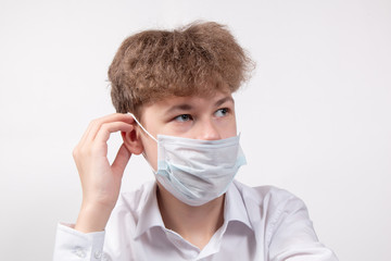 Boy in protective medical mask. Virus and coronavirus concept