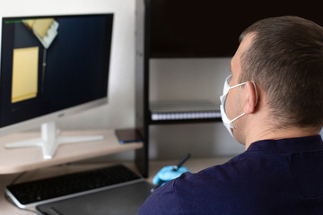 work from home, wearing a protective mask and gloves