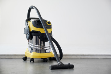 Professional vacuum cleaner in work. - obrazy, fototapety, plakaty