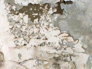 The old cracked wall is beige and gray.Grunge fashion background.