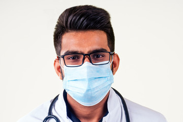 indian doctor in uniform at isolate on white background in studio