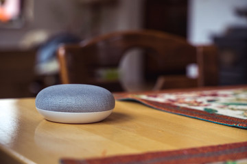 Obraz na płótnie Canvas Smart ai speaker in living room. Smart home concept