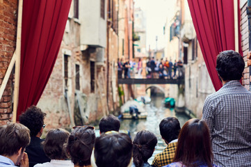 Audience looking at outdoor show in Venice