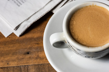 Obraz na płótnie Canvas cup of espresso on a wooden table