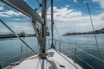 view of the bow of a sailboat in the sea