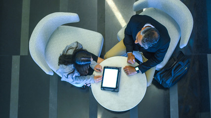 Business meeting and working, man and woman talking in a business metting.
