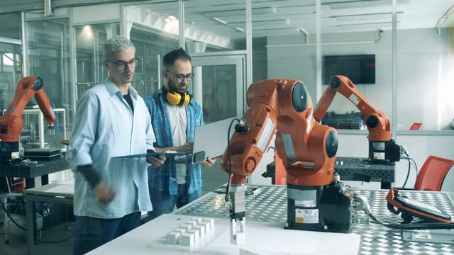 Science students are carrying out a test on a mechanized device