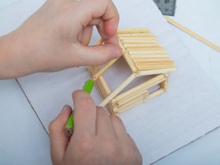 step-by-step instructions for creating a house from bamboo sticks. children's creativity, manual...