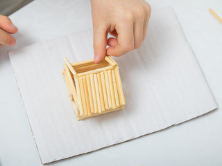 step-by-step instructions for creating a house from bamboo sticks. children's creativity, manual...