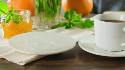 Bread with butter, Cup Coffee or tea, Tasty Breakfast. Close up.