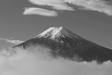 Mount Fuji and the snow on the top of the mountain. Black and white photo.