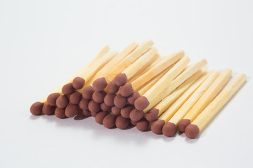 Close-up of a red match isolated on a white.