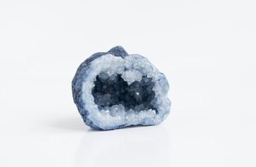 Blue quartz druse or geode mineral stone. Close up photo mineralogy and esotericism.