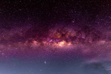 Fototapeta premium Night scenery with colorful and light yellow Milky Way Full of stars in the sky in summer Beautiful universe Background of space
