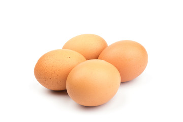 Brown chicken eggs, isolated on white background.