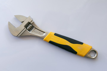 adjustable wrench on a white background