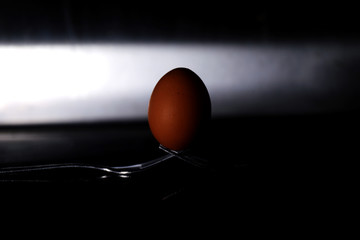 Egg standing on forks