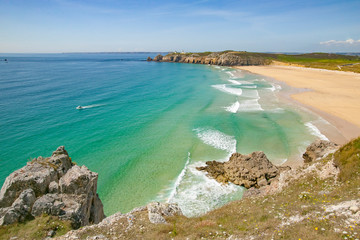 golden sand beach at the rocky coastline of Brittany, near Camaret-sur Mer, France