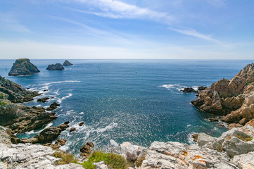 golden sand beach at the rocky coastline of Brittany, near Camaret-sur Mer, France