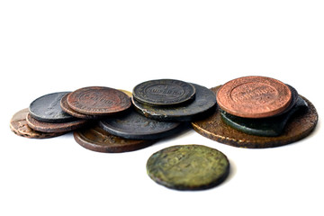 Vintage multi-colored Russian coins on a white background