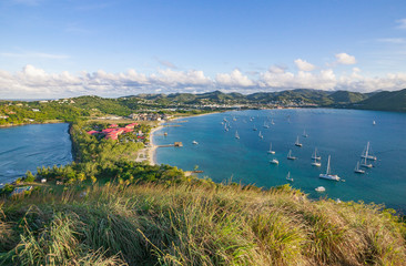 sailing yachts and motor vesseös anchoring in Rodney Bay on caribbean tropic island of St.Lucia,...