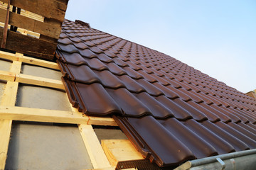 A tiled roof is newly covered