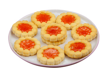 Tasty crispy fresh cookies on a plate on a White background