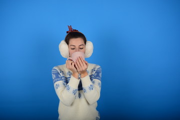 woman drinks warm coffee