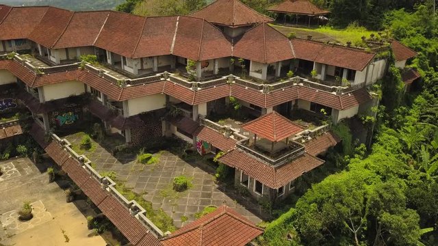Aerial drone video of abandoned hotel in Bedugul, Bali island.