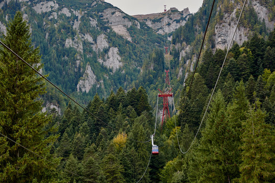 Mountain cable car, telecabin in the Bucegi Mountains. Mountain landscape in Bucegi Natural Park near Busteni, Romania.