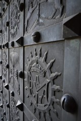 Old, antique, metal door to the church