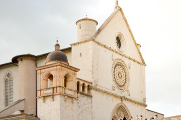 Fototapeta na wymiar Assisi, Italy. Just arrived in this little town from a pilgrimage on the Saint Francis way, the view of the church dedicated to the saint indicates the end of the trip and the time to rest