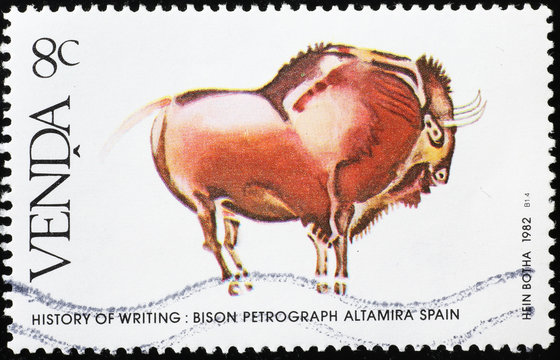 Prehistoric bison petrograph of Altamira, Spain, on postage stamp