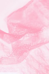 Pastel silk lace lingerie, pink color background