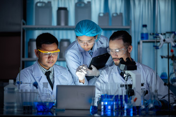 The researchers are working in a chemical laboratory.