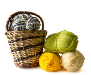 Photo illustration on knitting and needlework. The image is isolated on a white background. Yarn, knitting needles.