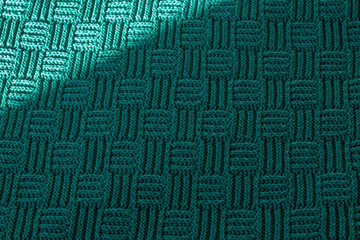 Pattern on a domestic rug made of squares
