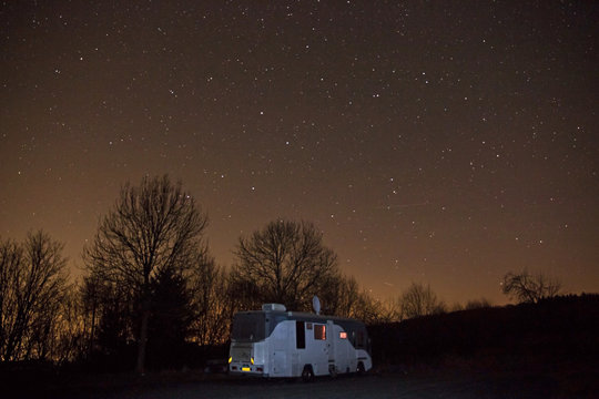 	
Motor Home Parked On A Starry Night	