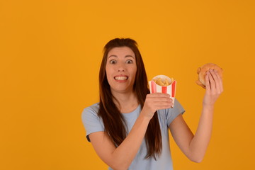 woman eating burger and french fries fast food advertisement junk food