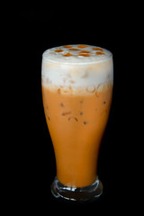 chayen or thai tea on black background