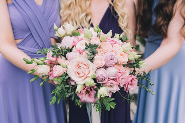 Bride and Bridesmaids holding Bouquets
