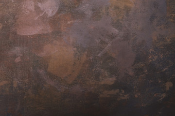 Brown canvas backdrop with stains. Artistic abstract background.