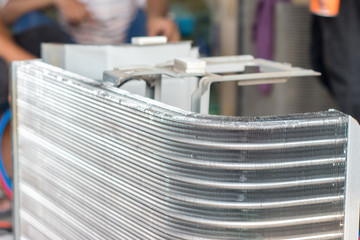 The air conditioner coil is a part of the system where the refrigerant absorbs heat.