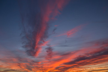 colorful sky during a sunset, orange and pink clouds, blue sky
