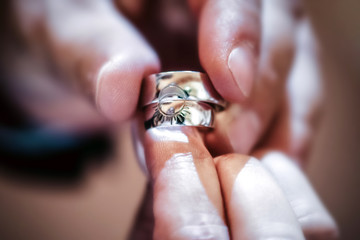 Closeup hands with wedding rings